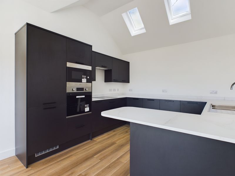 Property photo 2 of 7 Kitchen Area