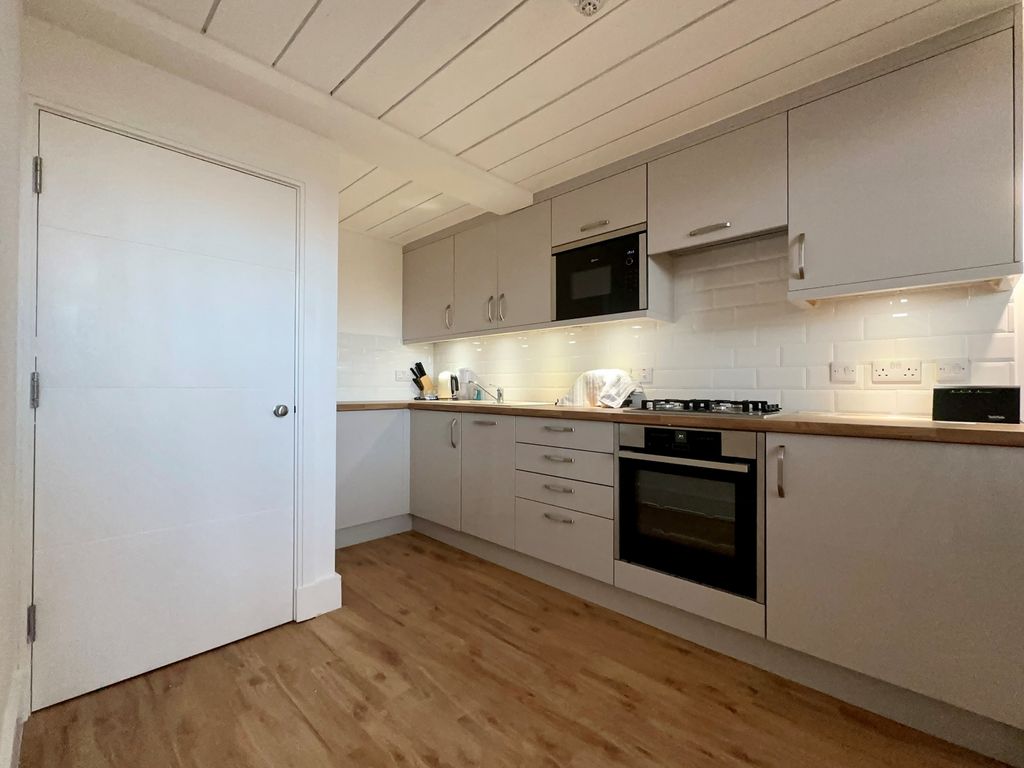 Property photo 3 of 8 Kitchen