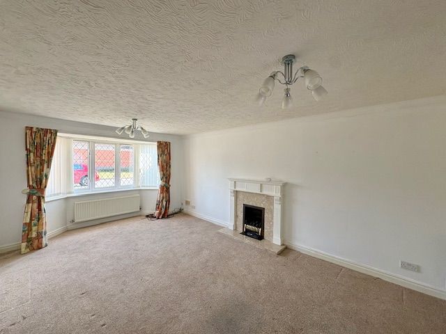 Property photo 3 of 18 Front