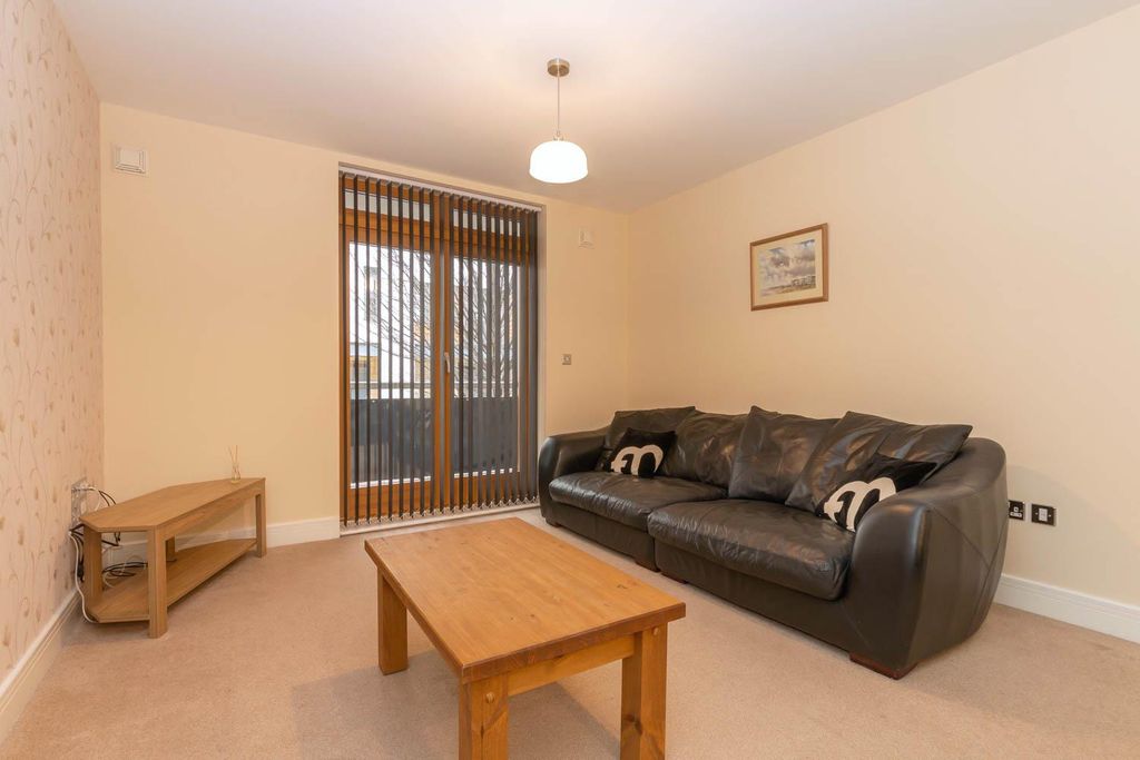 Property photo 1 of 11 Living Area