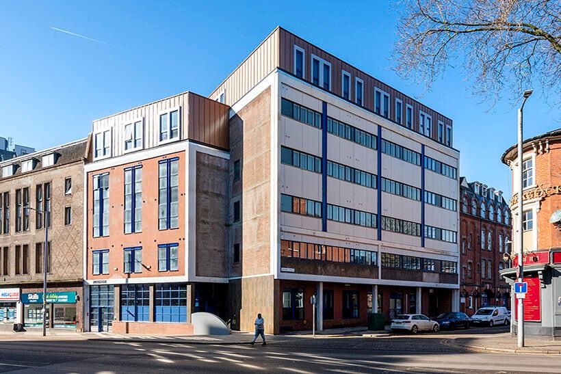 Property photo 1 of 8 Modern Multi-Story Building With Clean Brick And G...