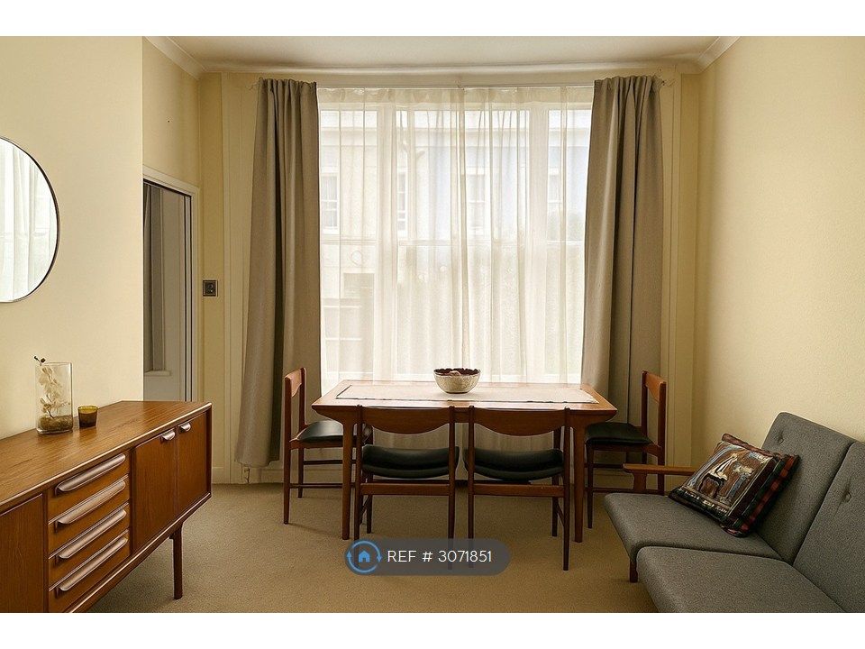Property photo 1 of 14 Living Room With Plenty Of Natural Light