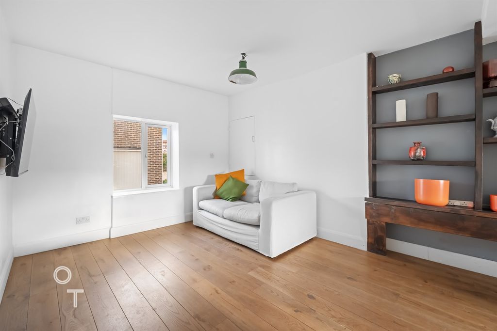 Property photo 3 of 8 Living Room Area