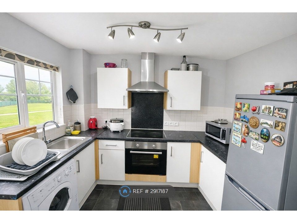 Property photo 3 of 8 Kitchen