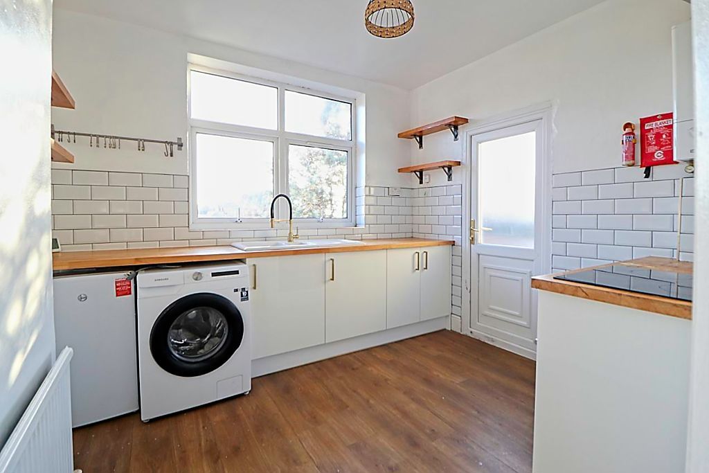 Property photo 3 of 13 Kitchen