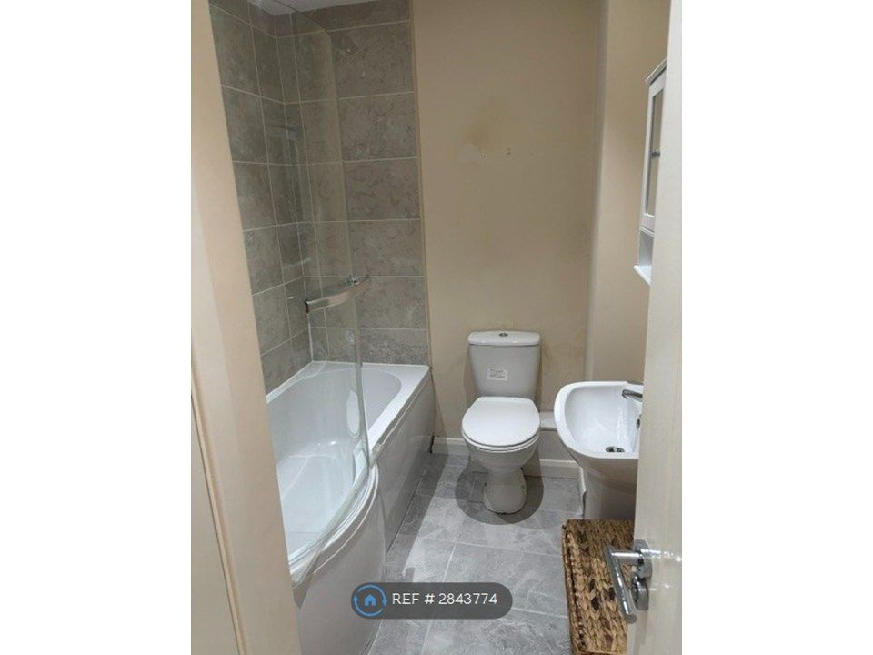 Property photo 3 of 6 Bathroom With Bath And Shower Above
