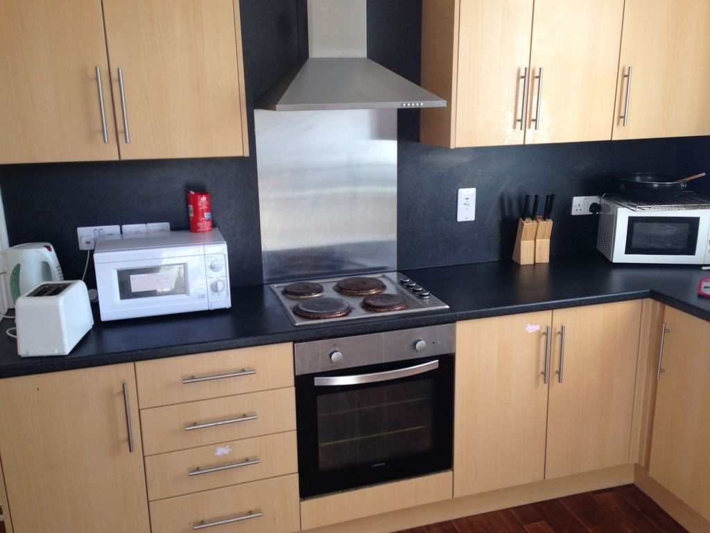 Property photo 3 of 7 Modern Fitted Kitchen With Light Wood Cabinets, Bl...
