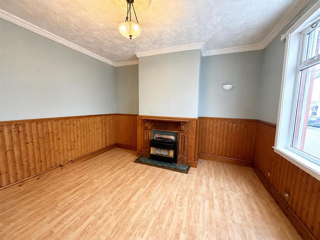 Property photo 2 of 12 Living Room: