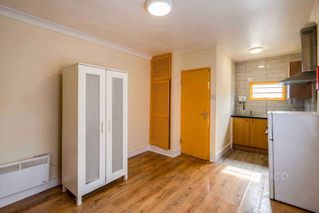 Property photo 2 of 7 Living Area 1