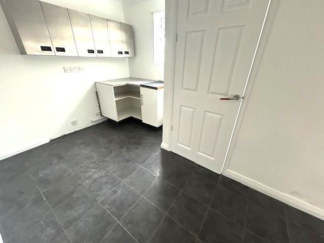 Property photo 2 of 8 Utility Room