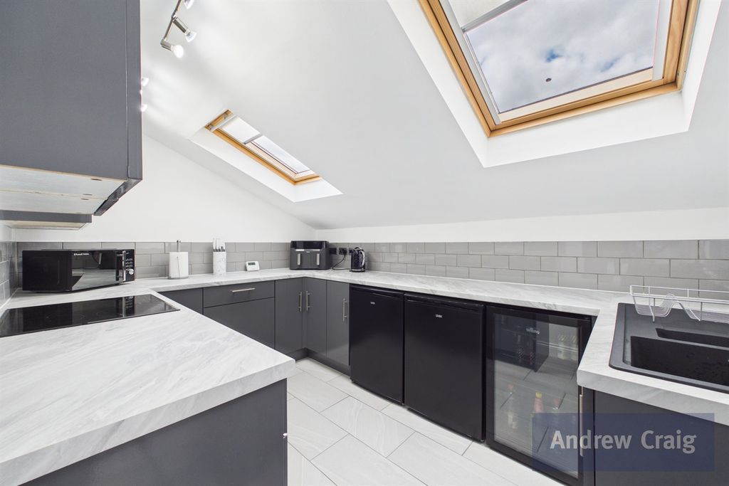 Property photo 2 of 12 Kitchen