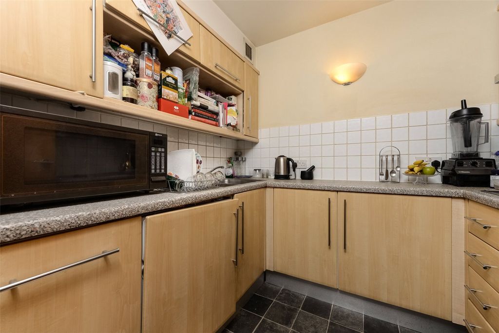 Property photo 3 of 8 Kitchen