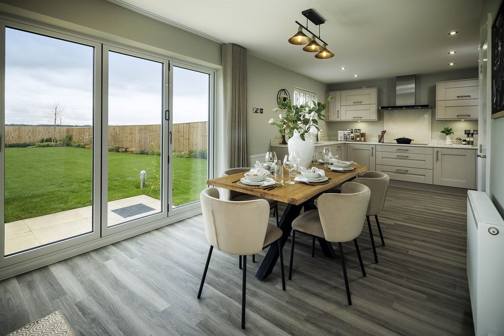 Property photo 3 of 13 Dining Kitchen