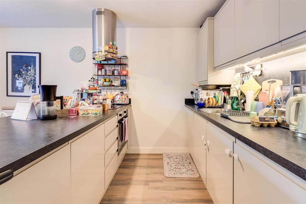 Property photo 3 of 17 Kitchen Area