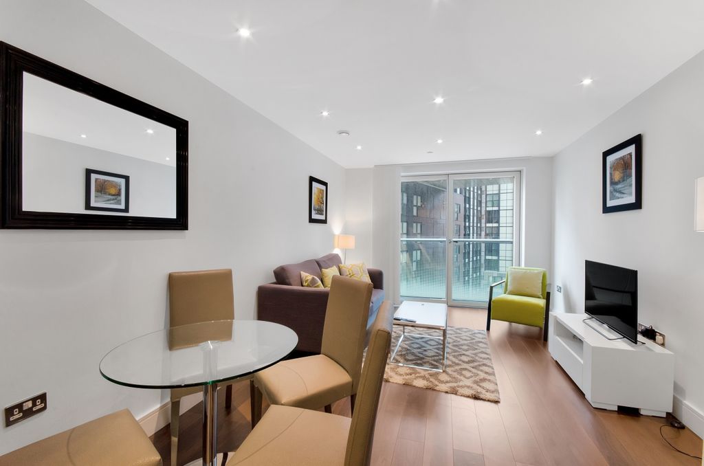 Property photo 1 of 8 Living Area