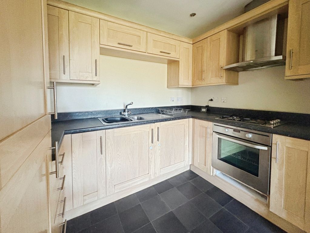 Property photo 3 of 7 Kitchen