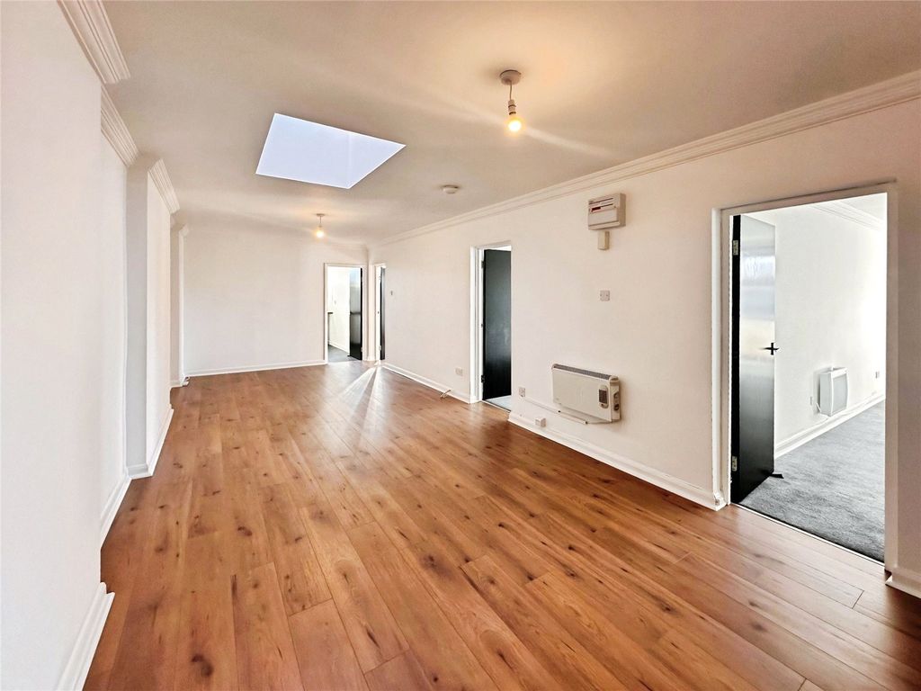 Property photo 3 of 12 Living Area