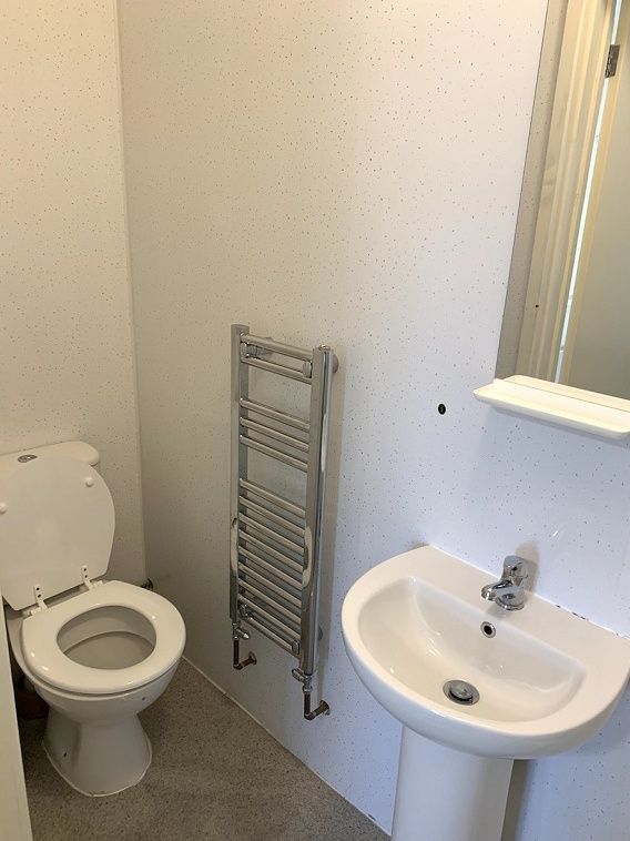 Property photo 2 of 22 A Clean And Simple Single Toilet Room Featuring A ...