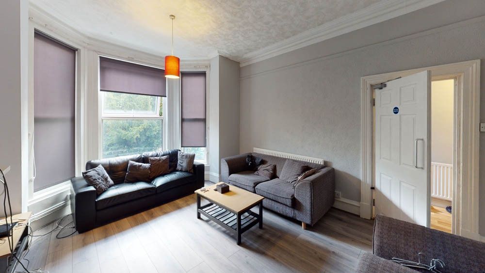 Property photo 2 of 9 A Contemporary Living Room Featuring Two Sofas, A ...
