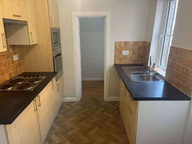 Property photo 2 of 9 Kitchen