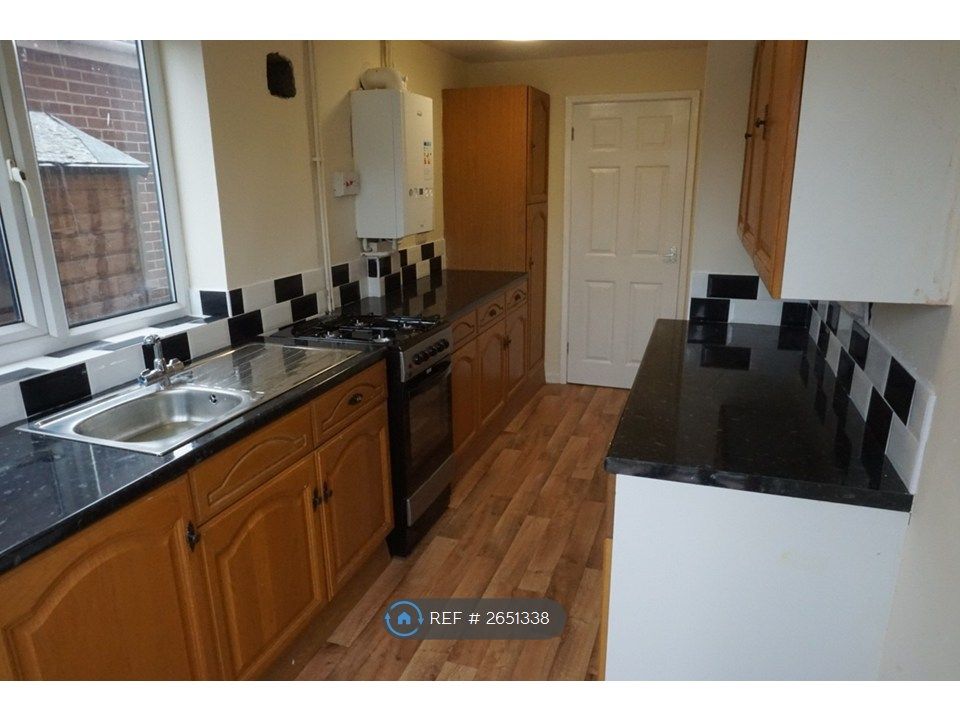 Property photo 3 of 9 Galley Kitchen