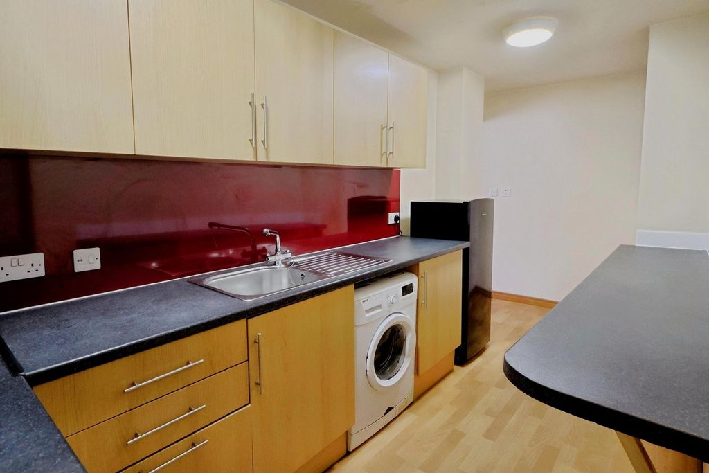 Property photo 3 of 17 Kitchen