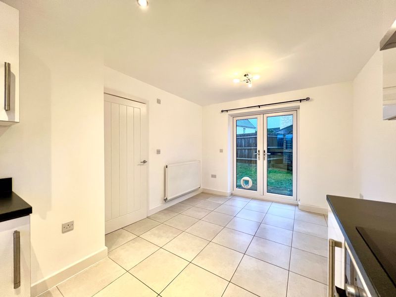 Property photo 3 of 12 Dining Kitchen