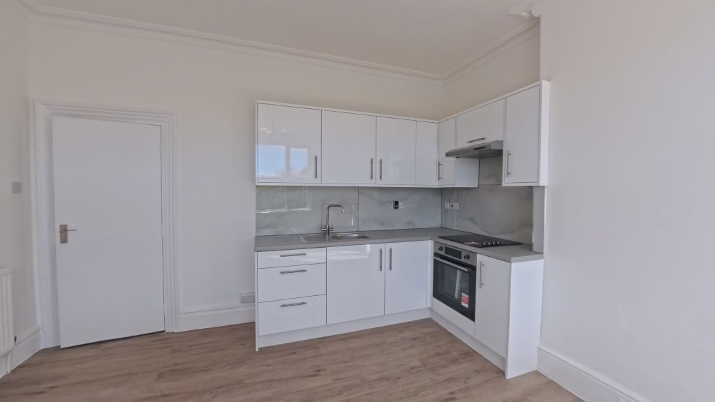 Property photo 3 of 8 Kitchen