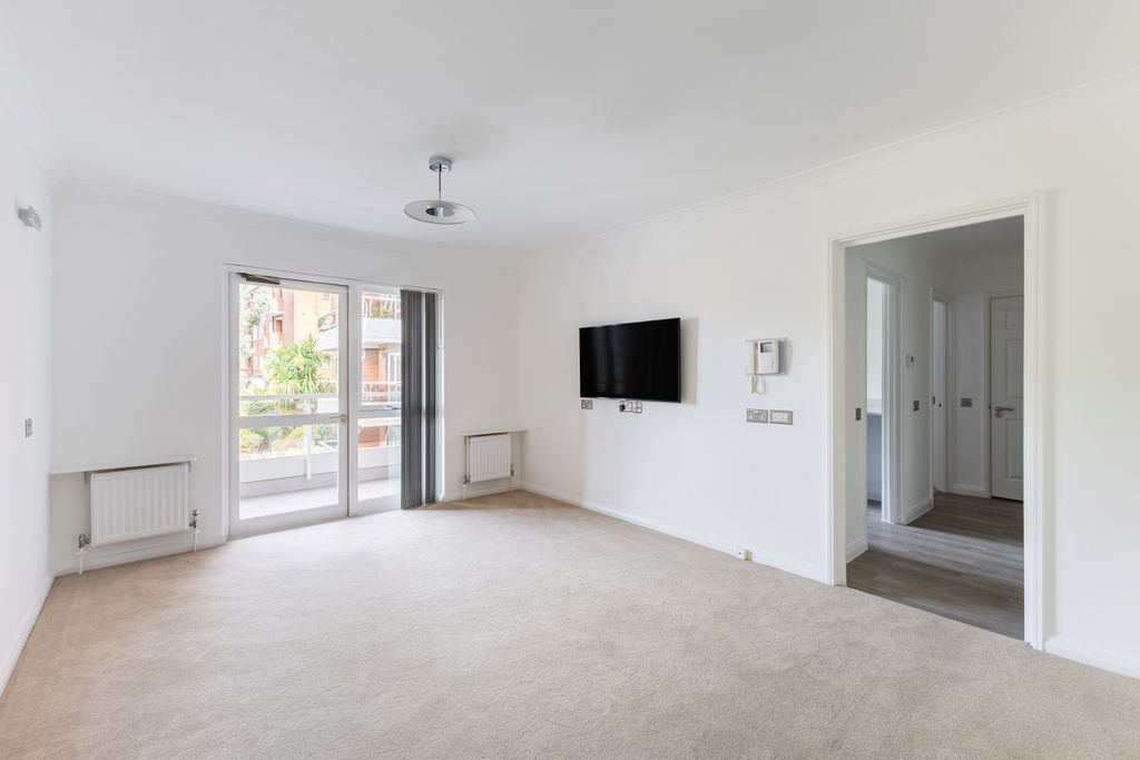 Property photo 3 of 11 Lounge Leading To Balcony Doors (Angle 1)