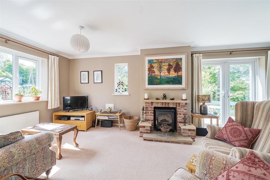 Property photo 3 of 24 Comfortable Sitting Room