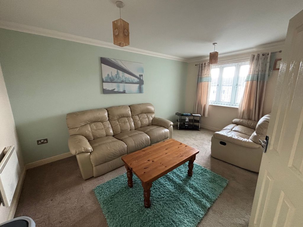 Property photo 2 of 10 Living Area