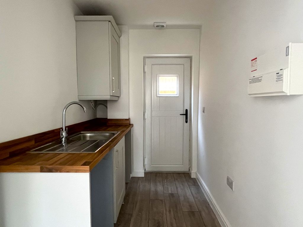 Property photo 2 of 13 Utility Room