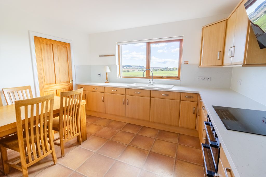 Property photo 2 of 27 Dining Kitchen
