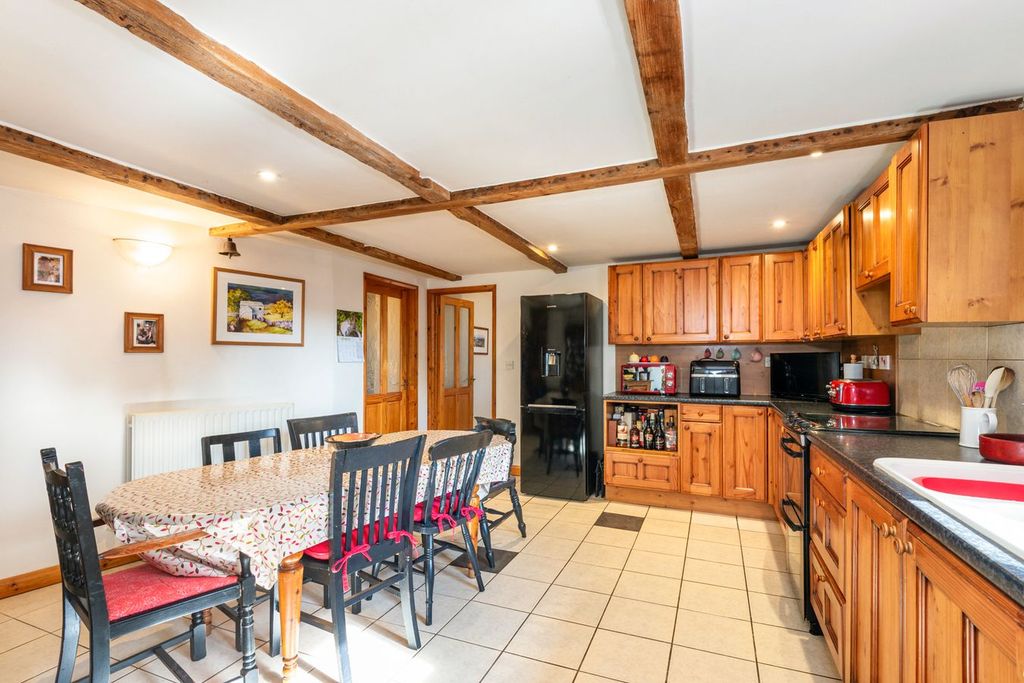 Property photo 2 of 19 Dining Kitchen