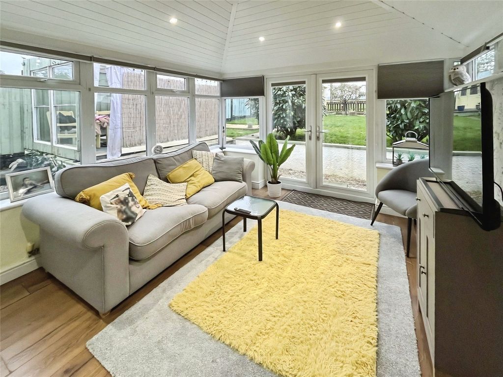 Property photo 3 of 12 Sun Room