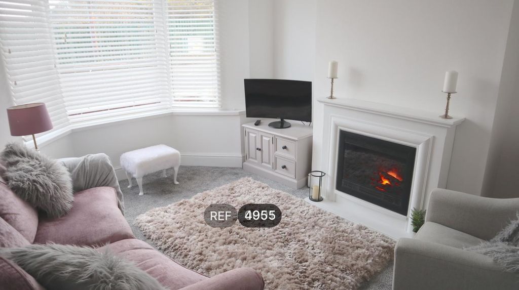 Property photo 2 of 8 Living Room