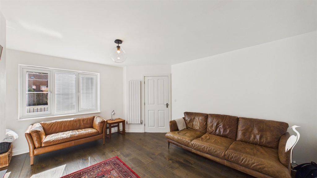 Property photo 3 of 32 Lounge/Dining Area