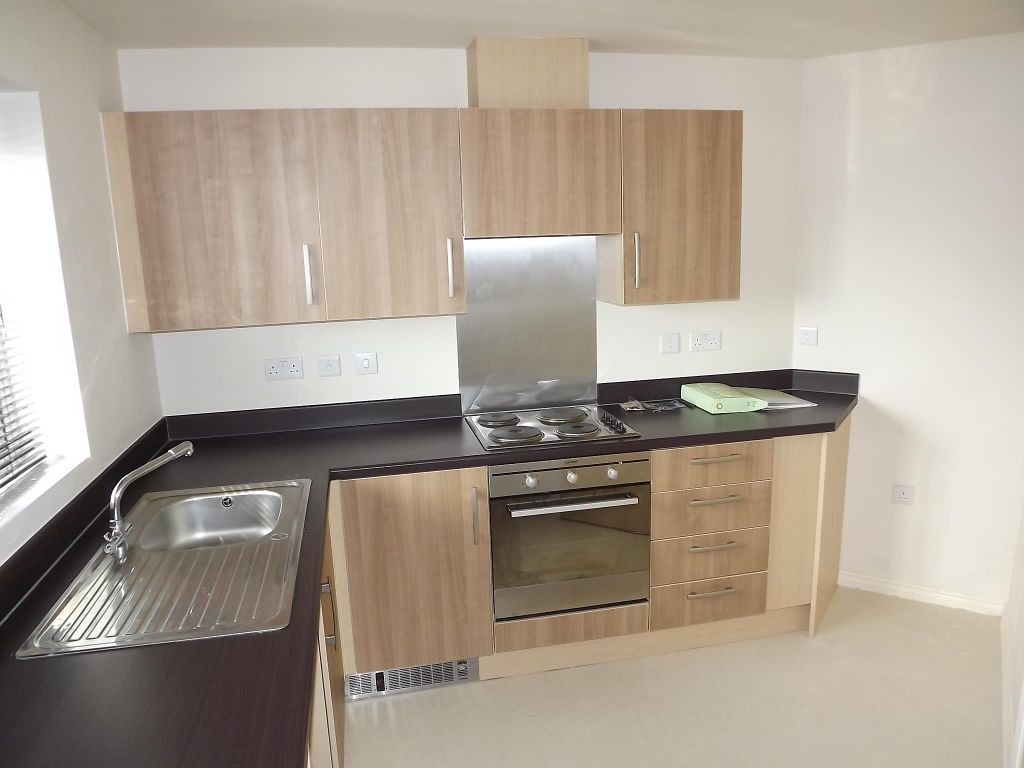 Property photo 3 of 7 Kitchen
