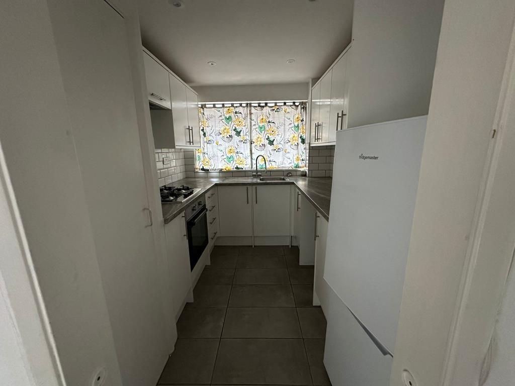 Property photo 3 of 9 Kitchen