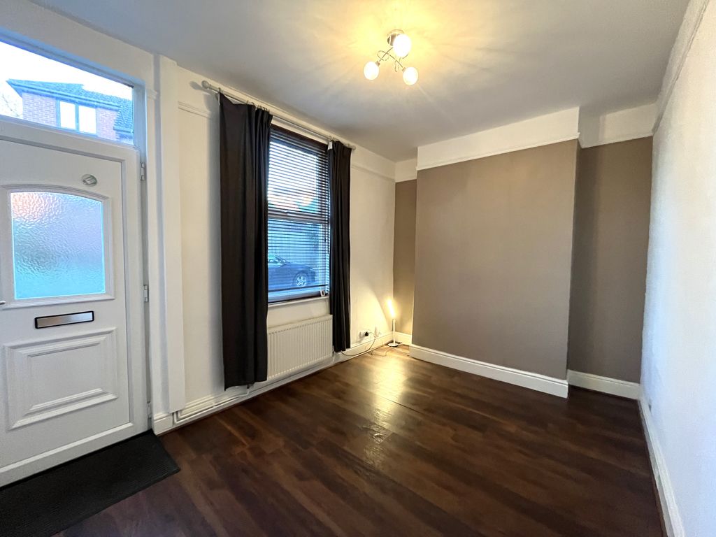 Property photo 2 of 9 Living Area