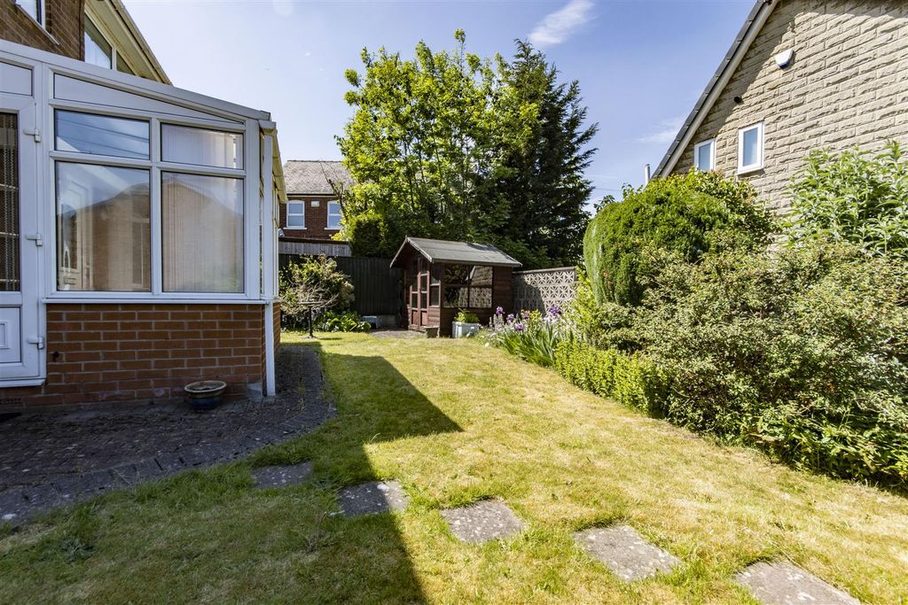 Property photo 3 of 13 Side Garden
