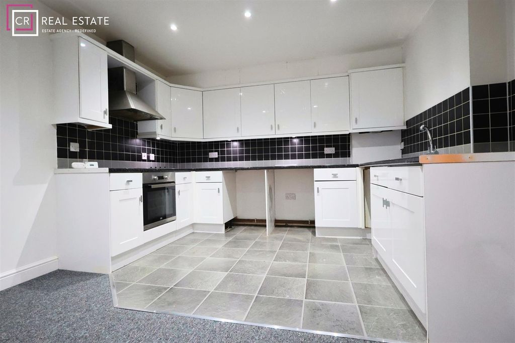 Property photo 2 of 7 Kitchen Area