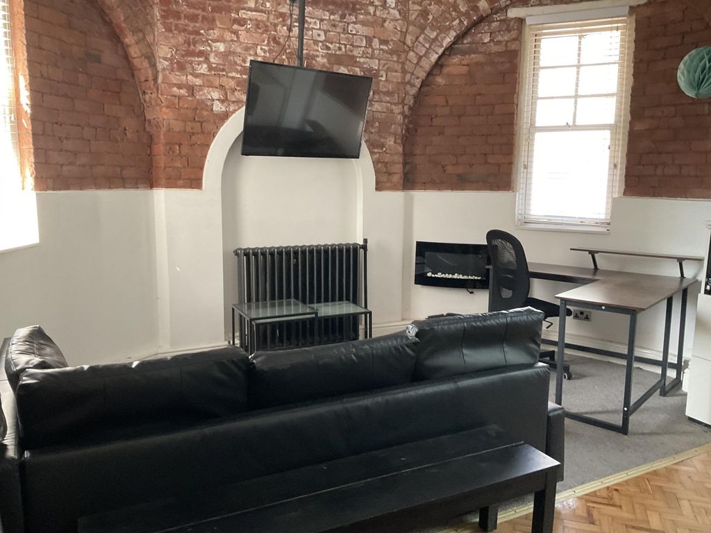 Property photo 1 of 11 A Stylish Communal Lounge Featuring Exposed Brick ...