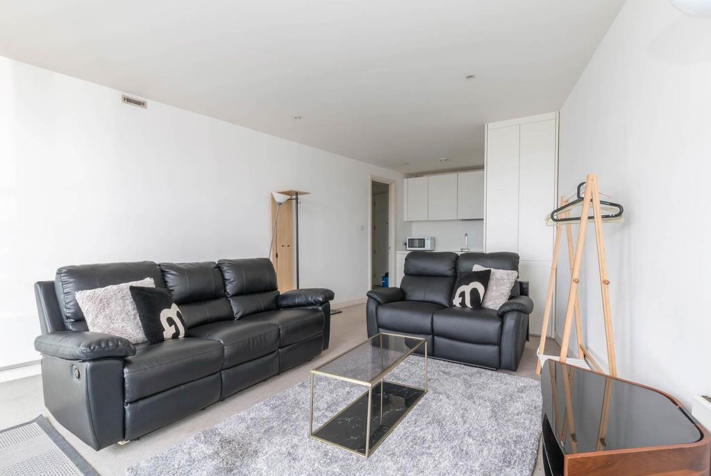 Property photo 2 of 9 Living Area