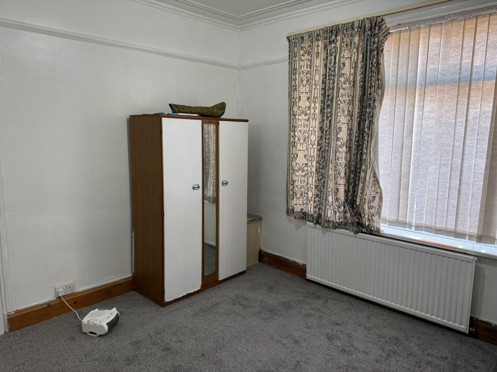 Property photo 2 of 12 Living Room 1