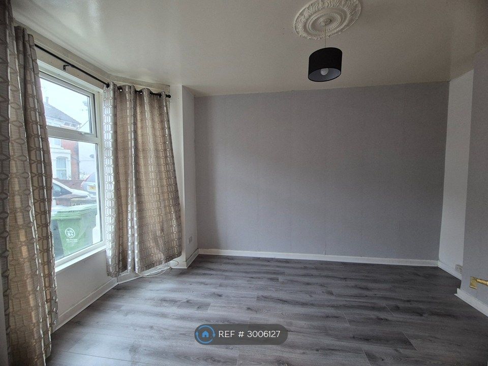 Property photo 3 of 12 Main Living Room