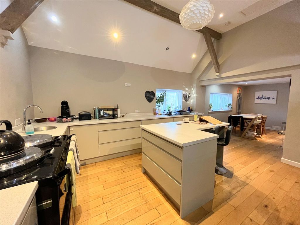 Property photo 3 of 9 Spacious Kitchen