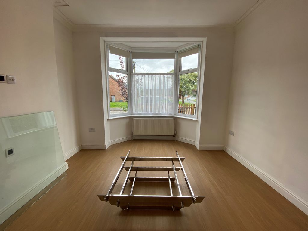 Property photo 3 of 12 Living Room 2