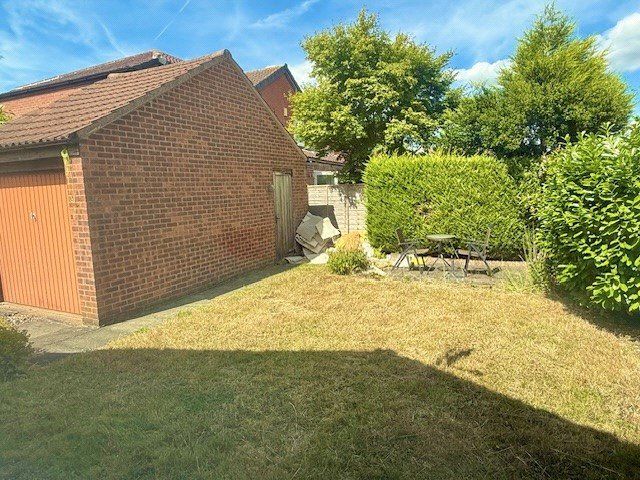 Property photo 2 of 11 Rear Garden &amp; Garage