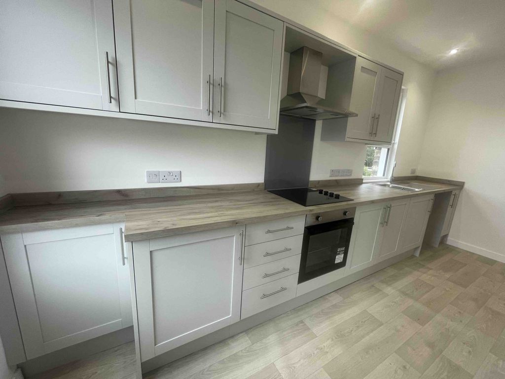 Property photo 3 of 7 Kitchen Area